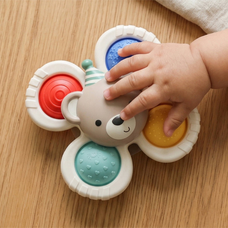 Itzy Ritzy | Itzy Pop & Whirl™ Fidget Spinner Travel & Bath Toy | Circus