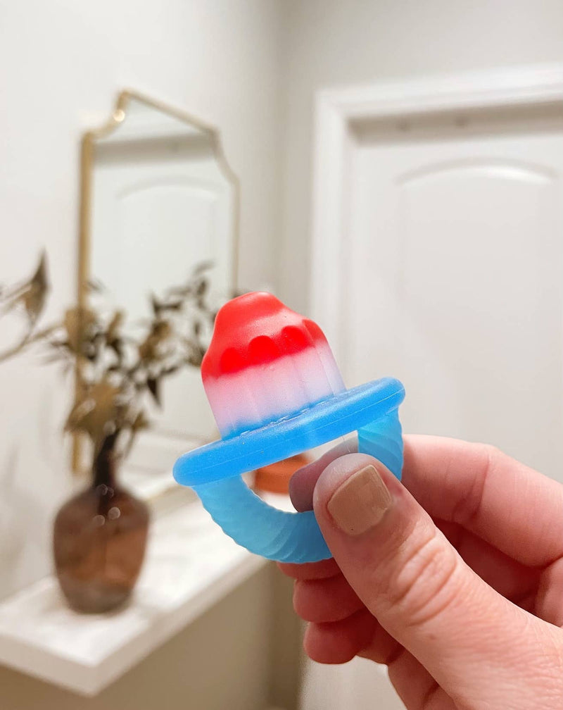 Itzy Ritzy | Teensy Teether™ Hero Pop Soothing Silicone Teether
