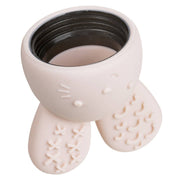 Cat-shaped cup with a black interior on a white background