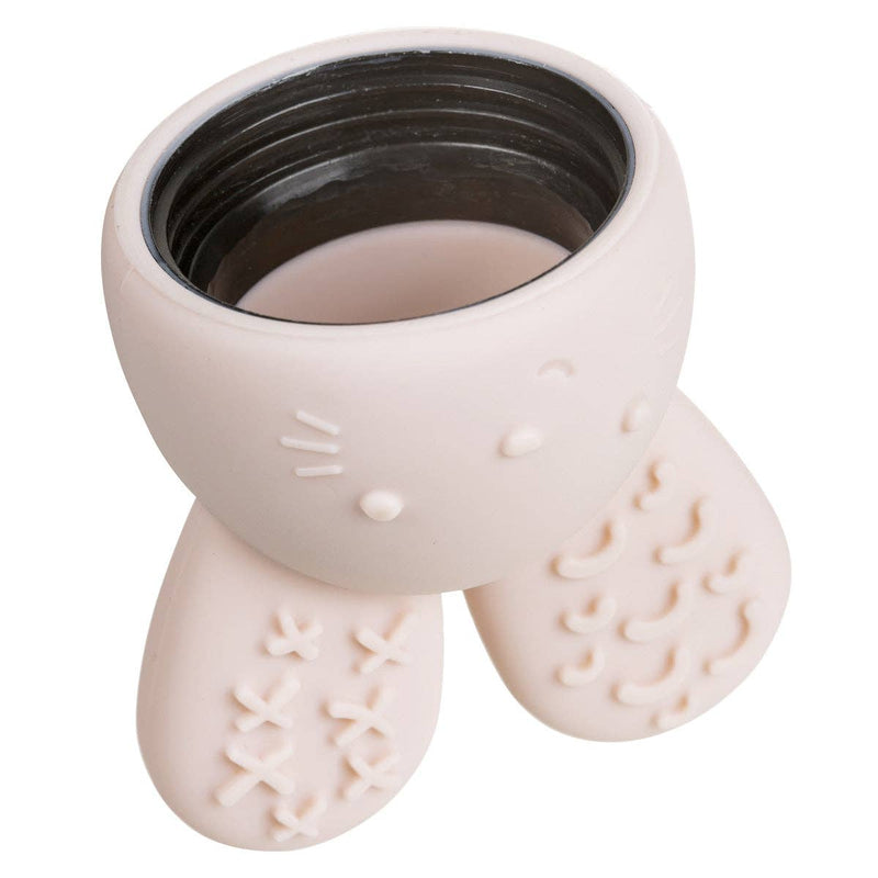 Cat-shaped cup with a black interior on a white background
