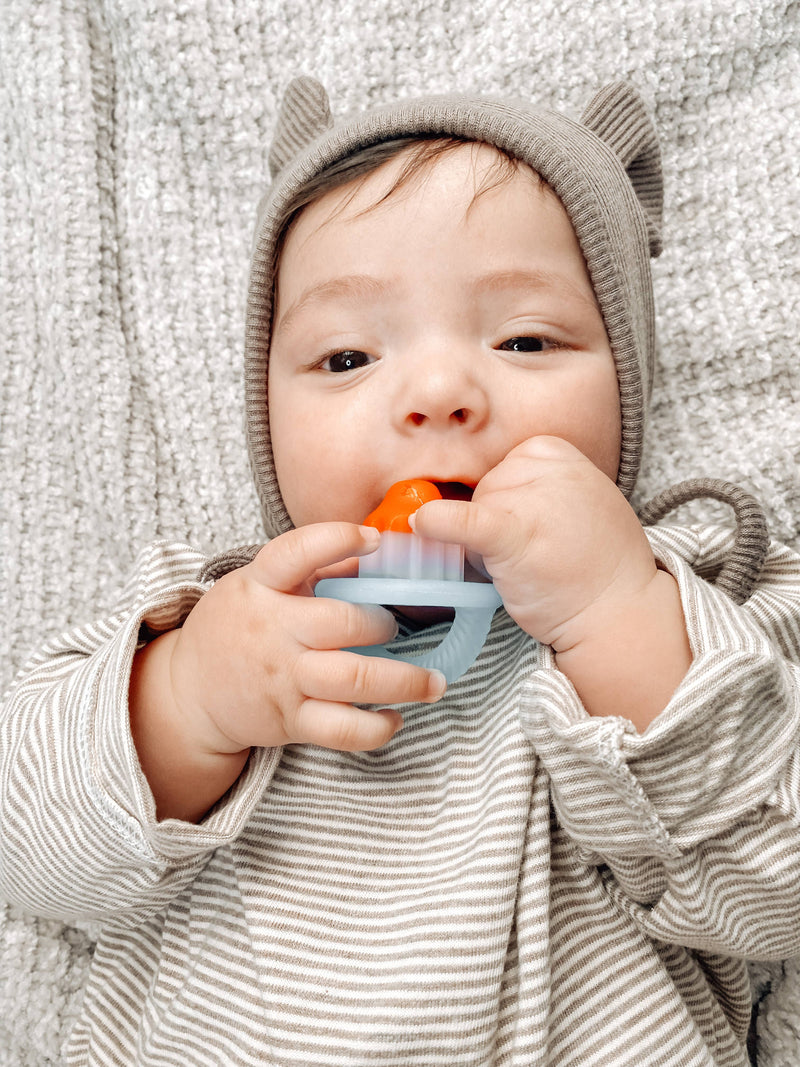 Itzy Ritzy | Teensy Teether™ Hero Pop Soothing Silicone Teether