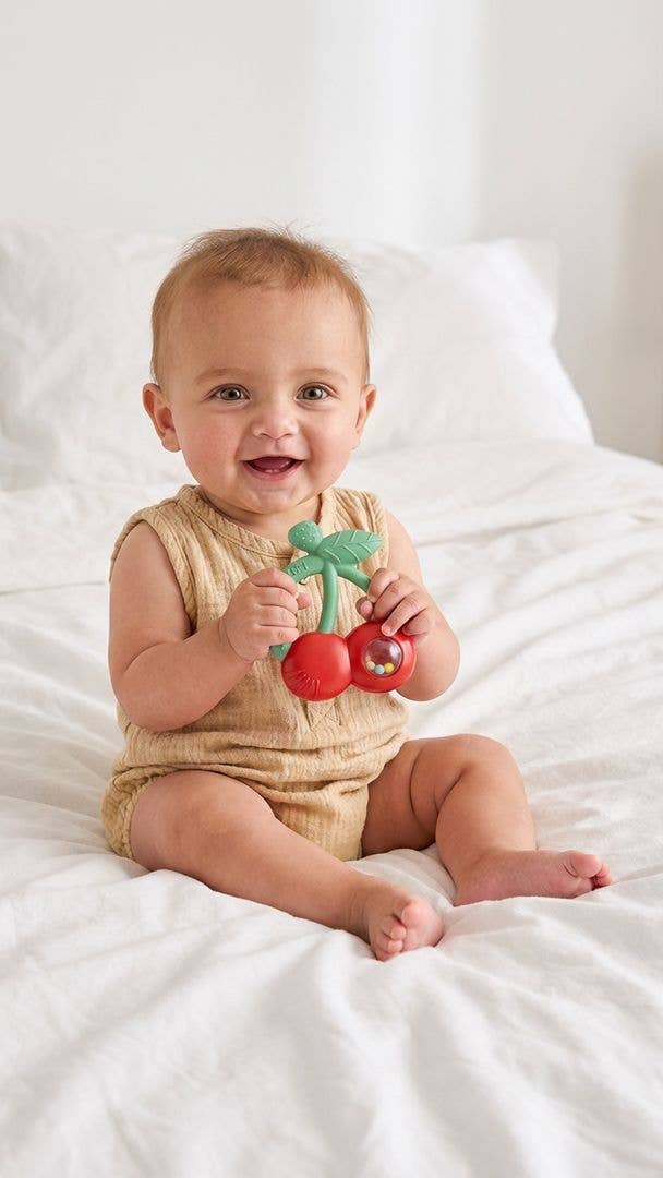 Itzy Ritzy | Bitzy Shake™ Silicone Teether with Rattle | Cherries