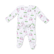 Baby onesie with golf-themed print on a white background