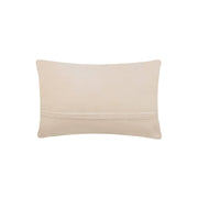Beige pillow on a white background