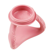 Pink silicone cone-shaped product on a white background