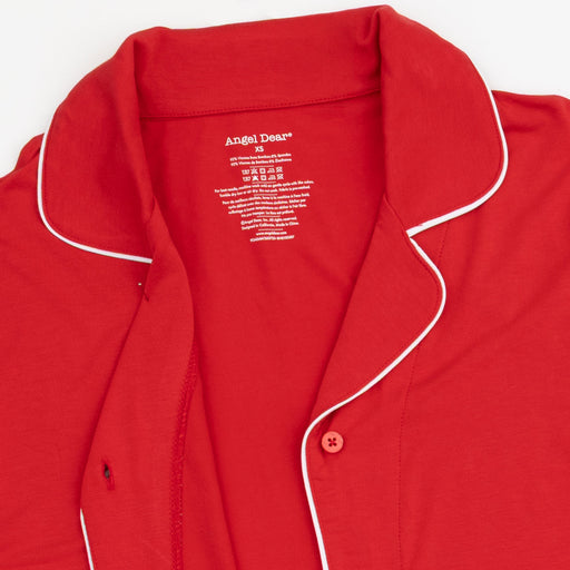 Close-up of the Angel Dear Ribbon Red kids pajama top collar with white piping