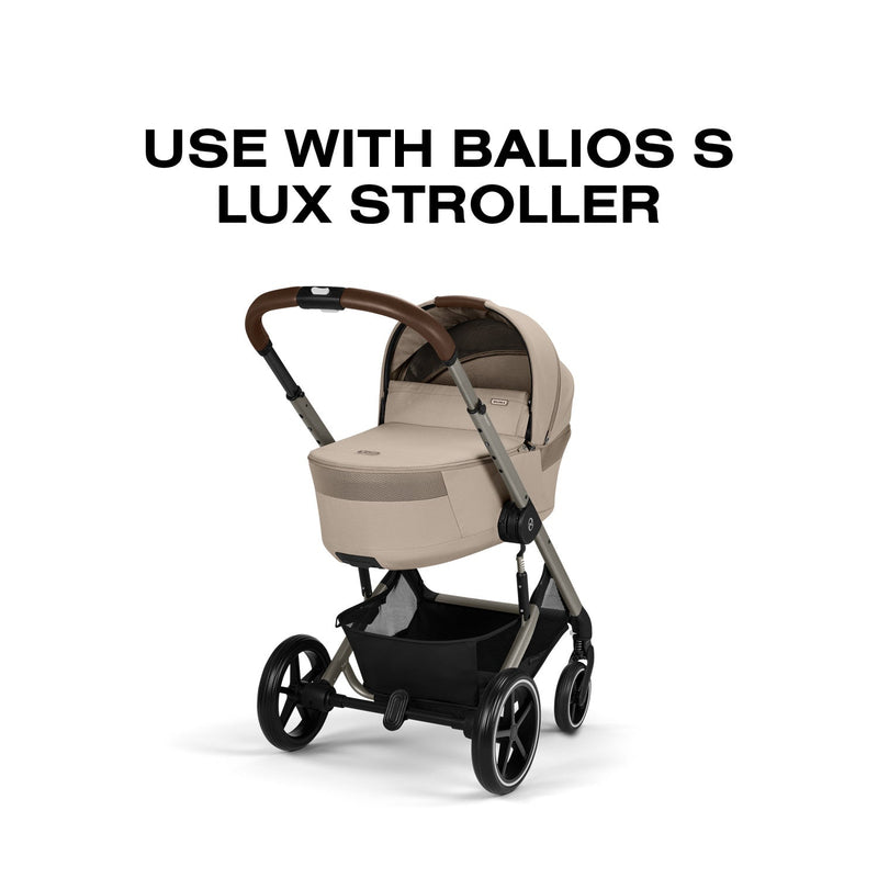 Cybex Balios Fold Cot in Almond Beige attached to the Balios S Lux stroller