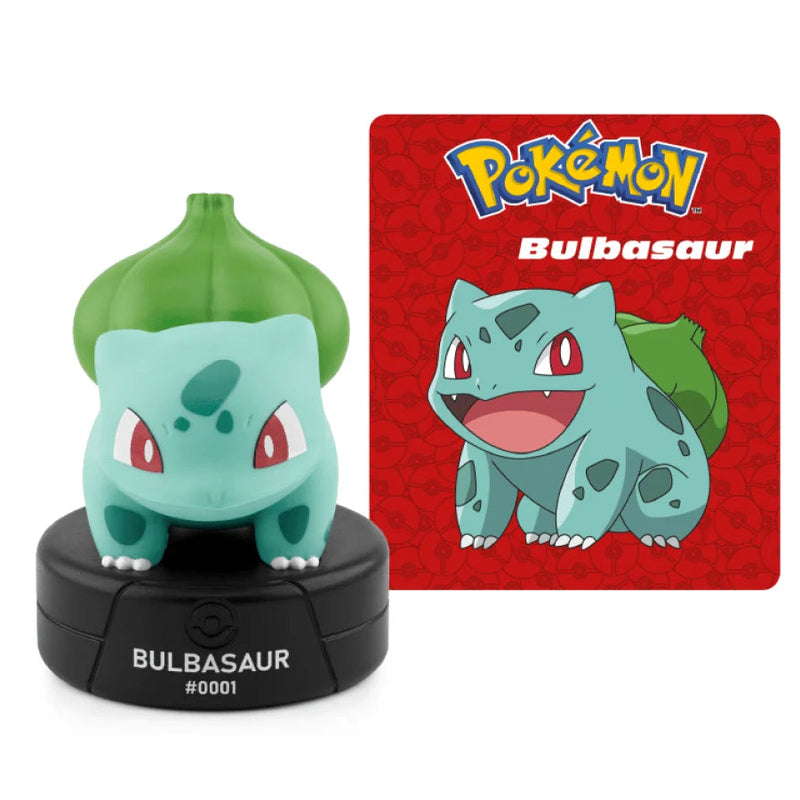 Pokémon Bulbasaur figurine with a Pokémon card in the background