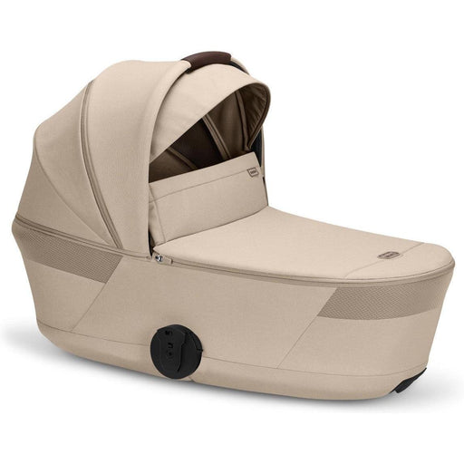Cybex Balios Fold Cot in Almond Beige with sun canopy extended