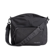 Itzy Ritzy transitional caddy and tote bag shown from the front with adjustable strap and exterior zip pocket