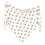 A white triangular baby swaddle blanket featuring an all-over print of yellow and gray construction excavators, displayed against a solid white background.