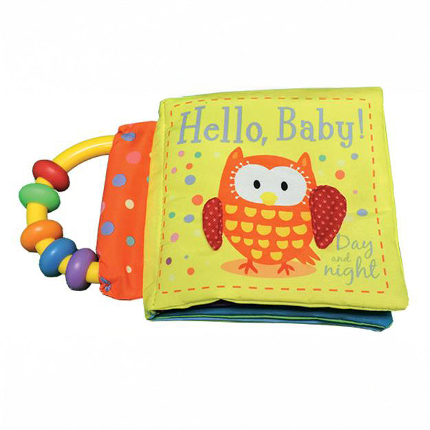 Cloth baby book titled Hello Baby Day and Night with an owl on the cover and a colorful rattle handle attached