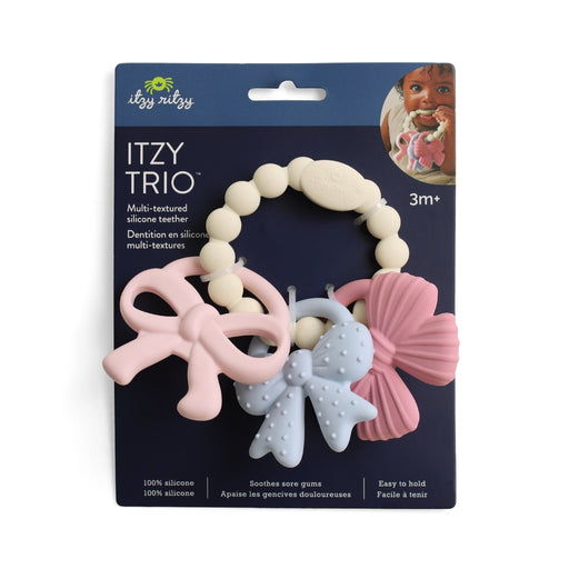 Itzy Trio silicone teething ring displayed in retail packaging