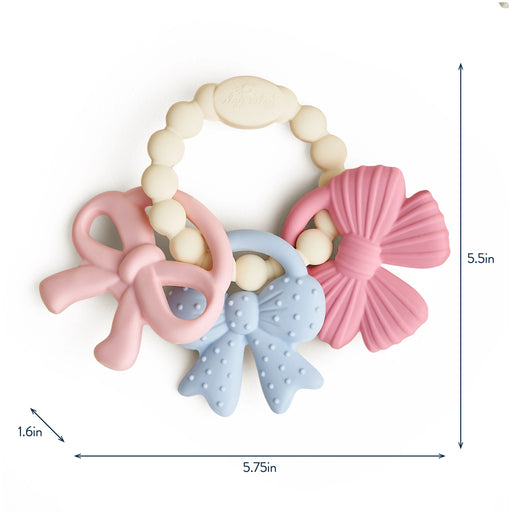 Silicone teething ring with three textured charms shown on a white background