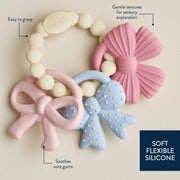 Close-up graphic highlighting different textures on the silicone teething charms
