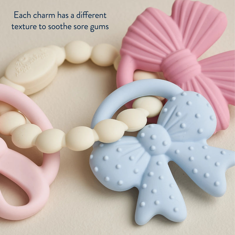 Detailed view of textured silicone charms designed to soothe sore gums