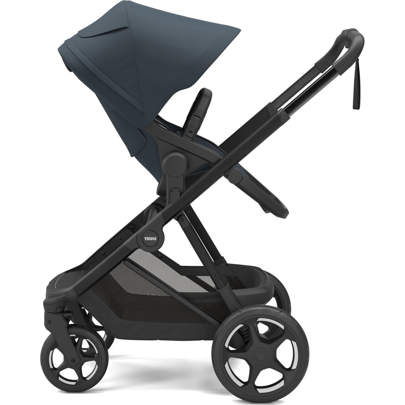 Thule Charm stroller in Darkest Blue with seat parent-facing