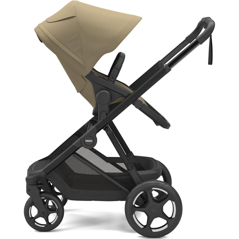 Thule Charm stroller in Faded Khaki with seat parent-facing