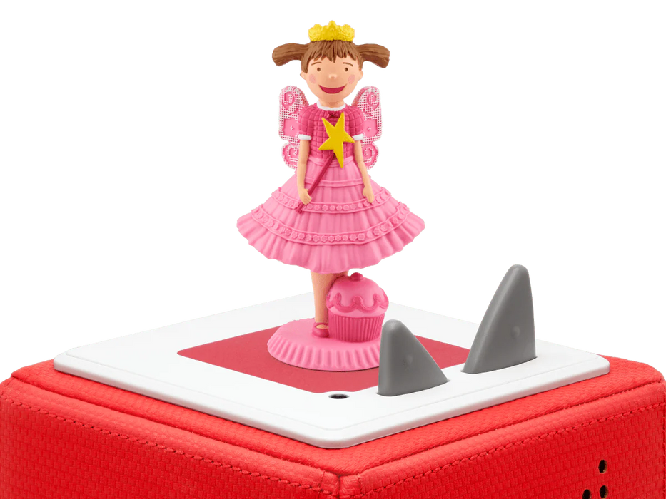 Pinkalicious Tonie standing on a red Toniebox next to the gray ears, close-up