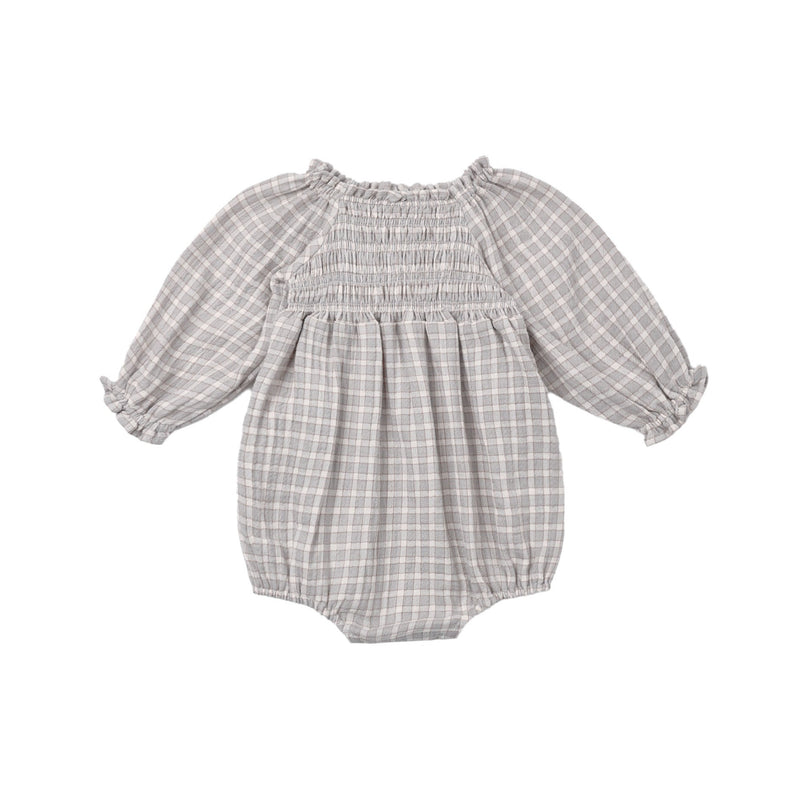 Gray checkered baby romper on a white background