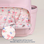 Interior view of the diaper bag displaying patterned lining and organized storage compartments