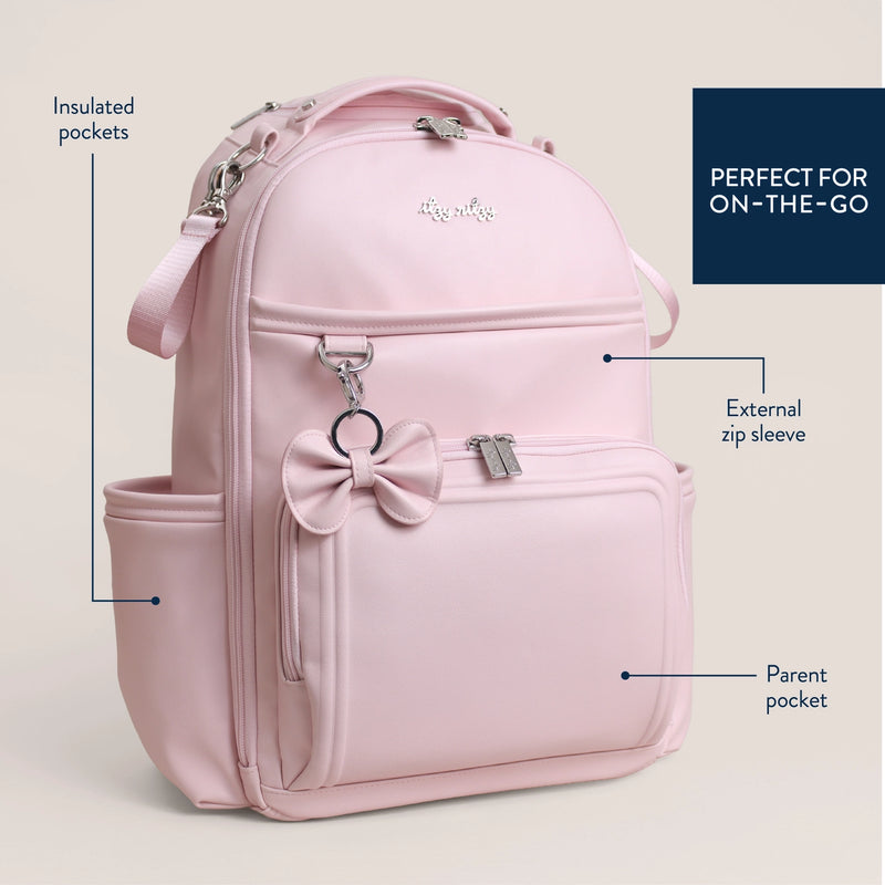 Itzy Ritzy Boss Plus backpack diaper bag shown styled for everyday use