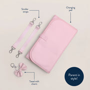 Close-up of included accessories such as stroller straps, tassel, and coordinating pouch