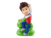 PAW Patrol Ryder Tonie figure seated on a green rock, white background