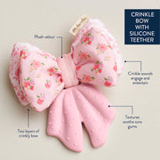 Product feature graphic showing plush crinkle fabric and silicone teether