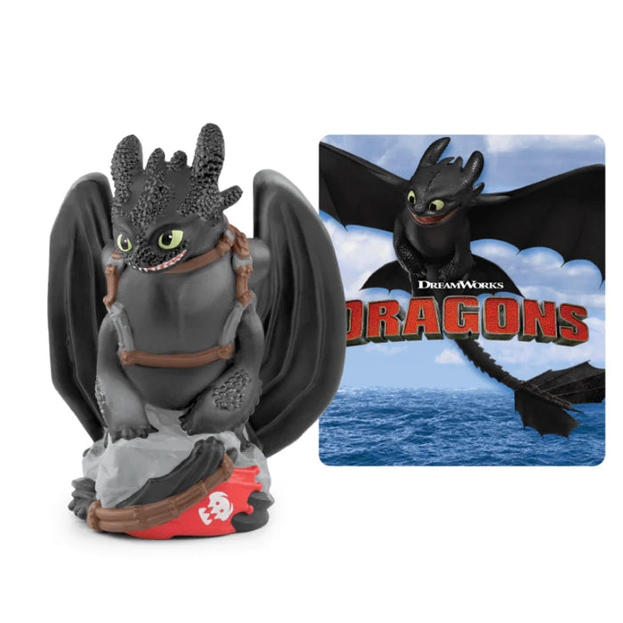 Toy figure of a dragon with 'How to Train Your Dragon' branding on a white background