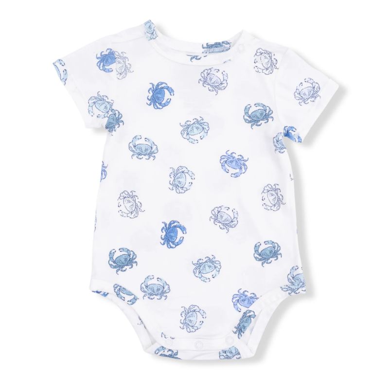 Baby wearing a brown and white striped long sleeve pant romper on a white background