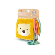 Packaged soft activity book with yellow bear cover and teething rings attached.