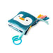 Soft blue penguin-themed fabric book with ribbon tags and attached teal teether.