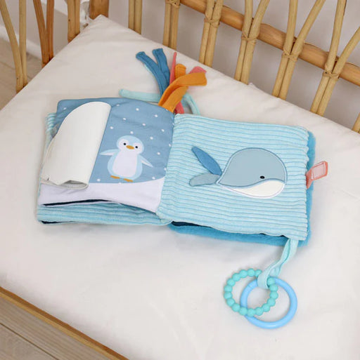 Ocean characters inside with textured pages and sensory details.