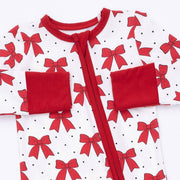Close-up of Angel Dear Festive Bows convertible romper showing the red zipper, red neckline and fold-over hand cuffs