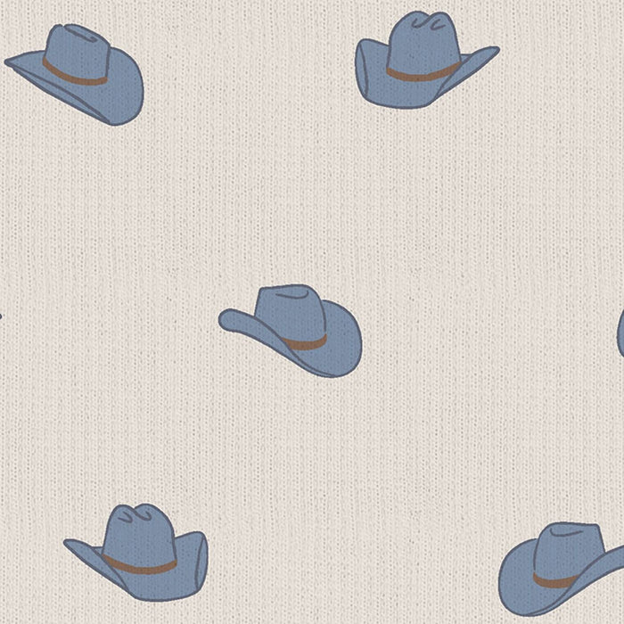 Close-up swatch of blue cowboy hats print on ribbed knit