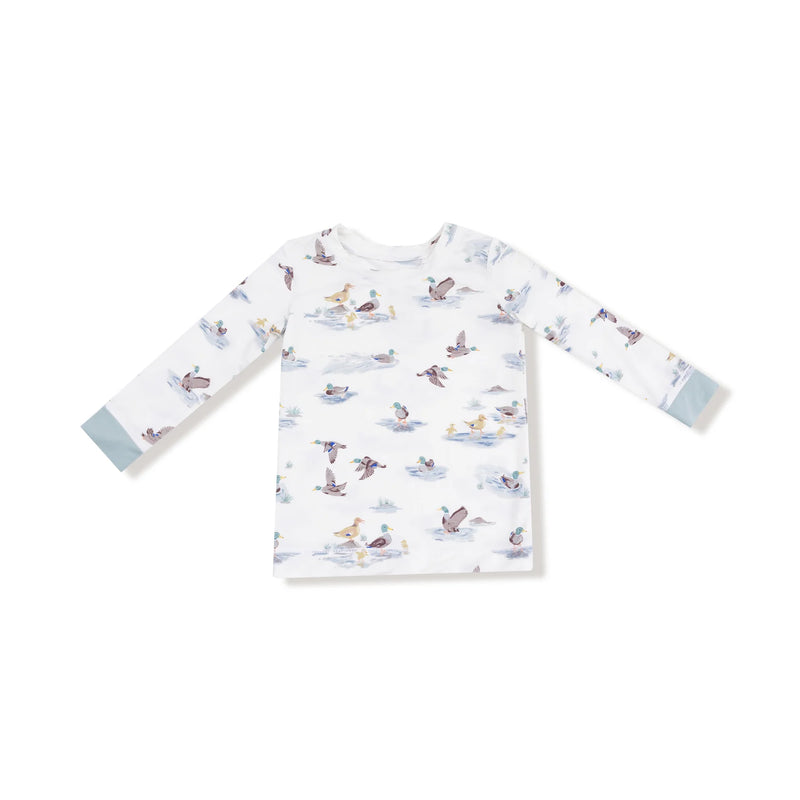 Closeup of long-sleeve top in Migrating Mallards print with blue cuffs