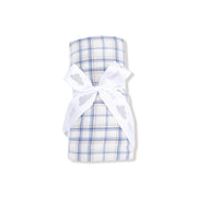 Blue plaid muslin swaddle rolled and tied with white ribbon