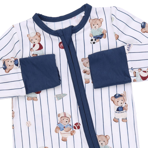 Baby onesie with teddy bear pattern and navy accents on a white background