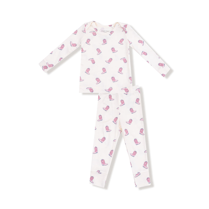 White baby onesie with pink boot print on a white background