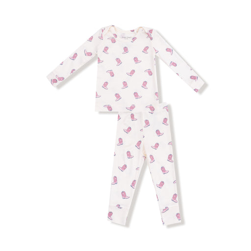 White baby onesie with pink boot print on a white background