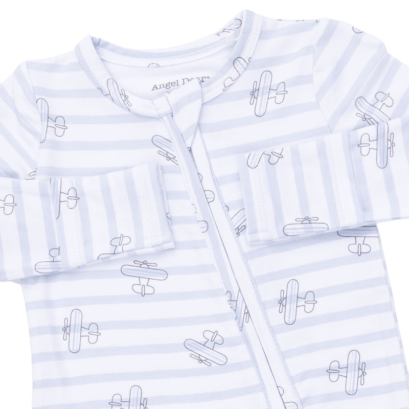 Baby outfit with airplane pattern on a white background