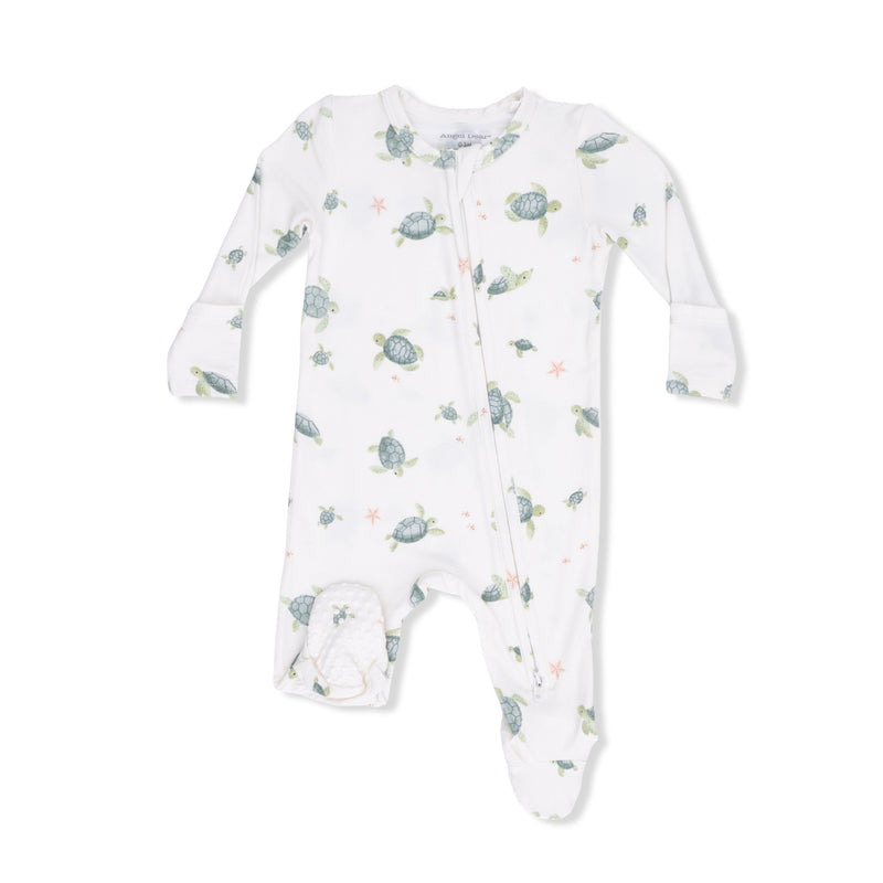 Baby onesie with turtle pattern on a white background