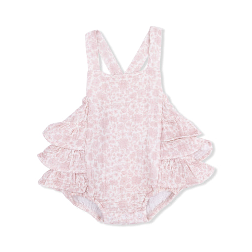 Pink floral ruffled sunsuit on a white background
