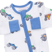 Baby outfit with blue trim and monster truck prints on a white background