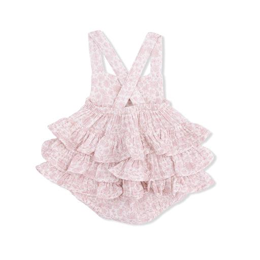 Pink floral ruffled romper on a white background