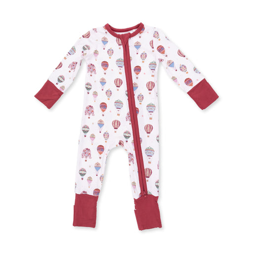 A baby long-sleeve footed sleeper with a white background, decorated with a colorful hot air balloon pattern, featuring solid red cuffs, collar, and zipper trim.