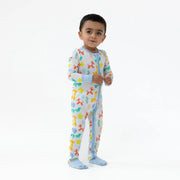 Toddler standing and wearing the Blue Balloon Animals romper against a white backdrop.