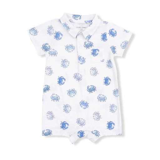 White baby romper with blue crab pattern on a white background