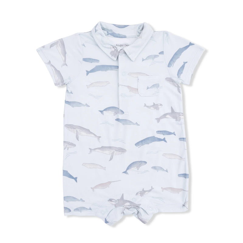 Baby romper with whale pattern on a white background